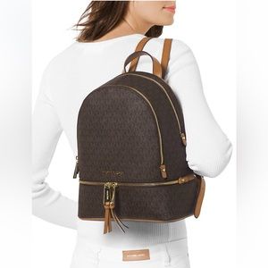 Michael Kors NWOT never used mini backpack, one size, brown